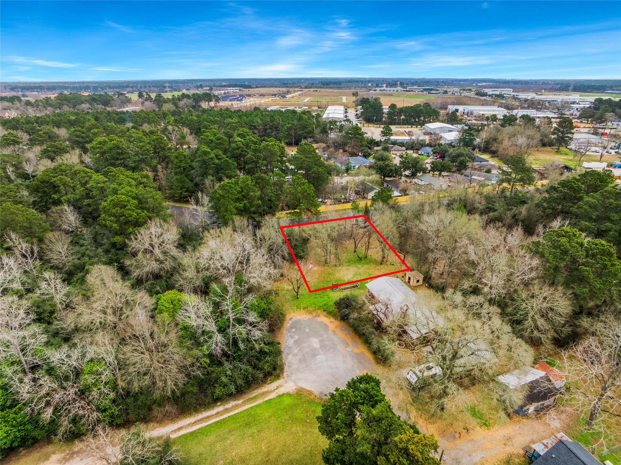 650 Texas Street Tomball, TX 77375 - Photo 9 of 22 an aerial view of residential houses with outdoor space
