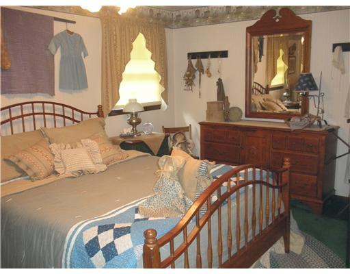 1155 O'Block Road Plum, PA 15239 - Photo 11 of 18 Master Bedroom. MASTER BEDROOM OFFERS A WALK-IN-CLOSET, PADDLE FAN, LAUNDRY CHUTE AND ITS OWN PRIVATE BATH.