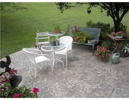 1155 O'Block Road Plum, PA 15239 - Photo 18 of 18 Patio/Deck. VIEW OF THE NEWER STONE PATIO OVERLOOKING THE PRIVATE ACREAGE.