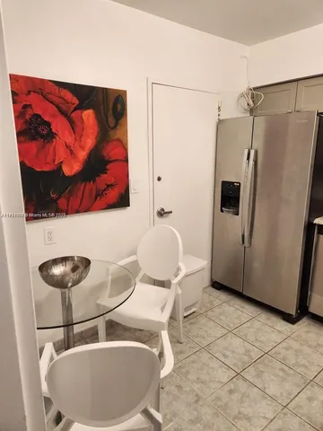 a bathroom with a sink toilet and mirror