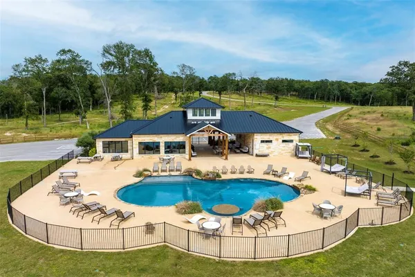 a view of a house with a swimming pool