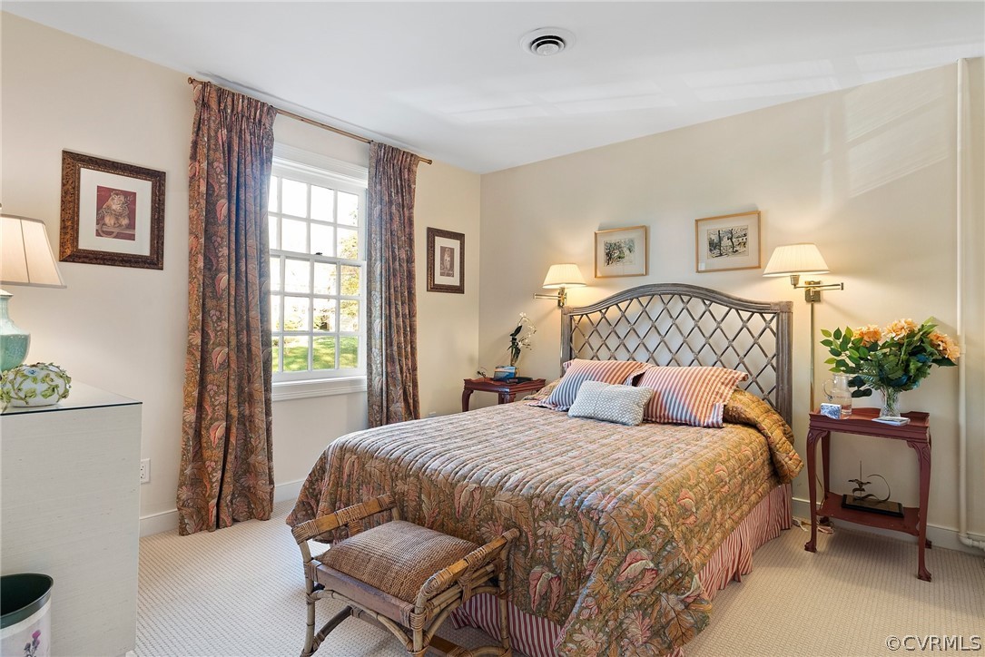 6161 River Road, Unit 27 Richmond, VA 23226 - Photo 13 of 26 a bedroom with a bed and a window