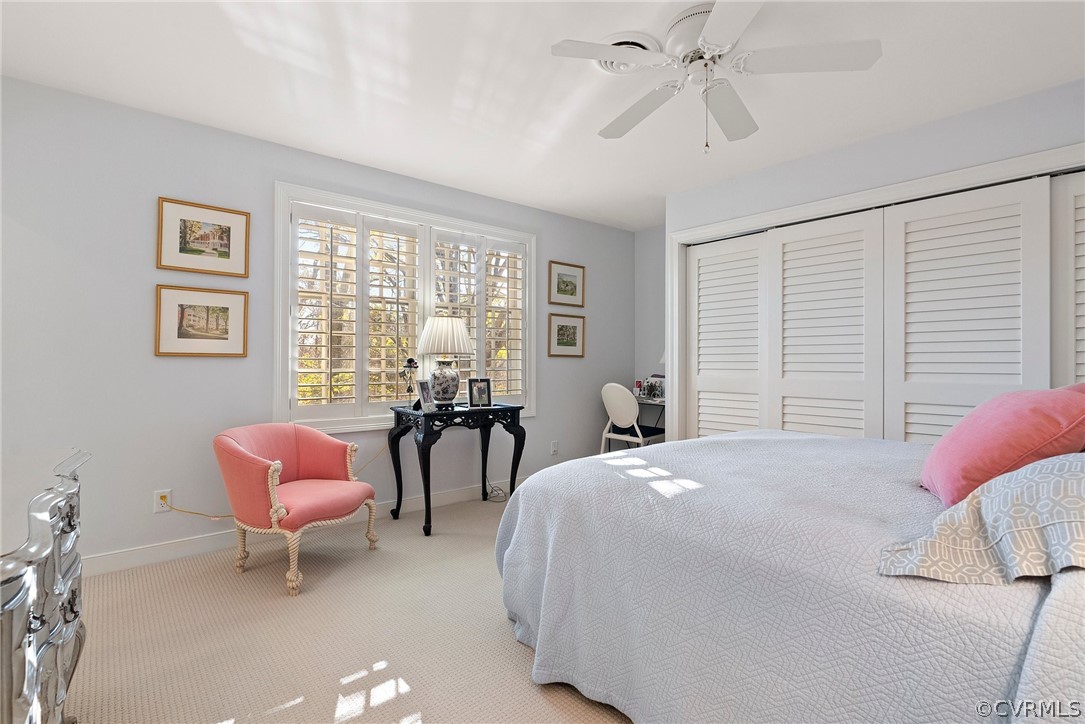 6161 River Road, Unit 27 Richmond, VA 23226 - Photo 16 of 26 a bedroom with a bed and a chair