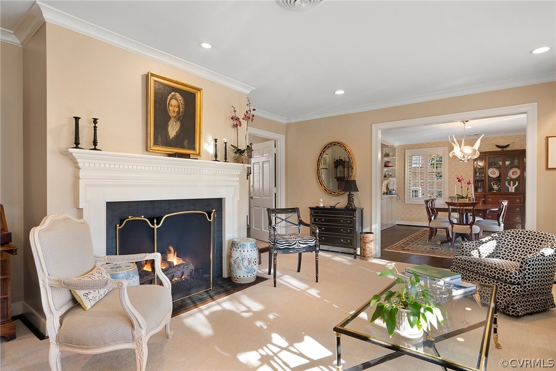 6161 River Road, Unit 27 Richmond, VA 23226 - Photo 2 of 26 a living room with furniture a fireplace and a table