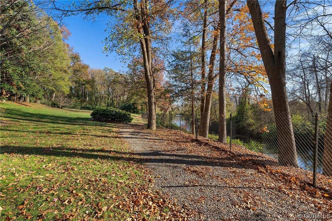 6161 River Road, Unit 27 Richmond, VA 23226 - Photo 23 of 26 a view of a yard with large trees