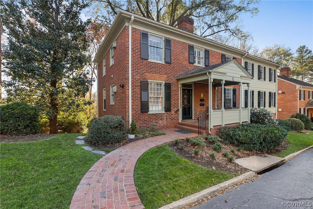 6161 River Road, Unit 27 Richmond, VA 23226 - Photo 24 of 26 a front view of a house with a yard