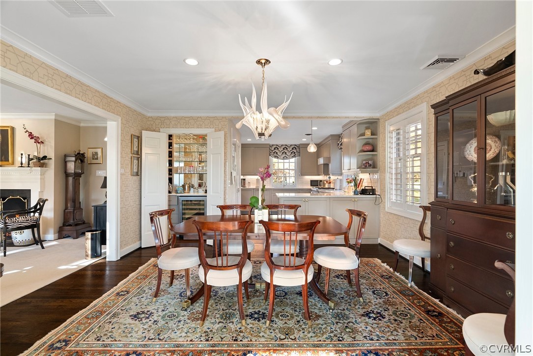 6161 River Road, Unit 27 Richmond, VA 23226 - Photo 5 of 26 a dining room with wooden floor and stainless steel appliances
