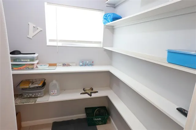 a room with storage and utility