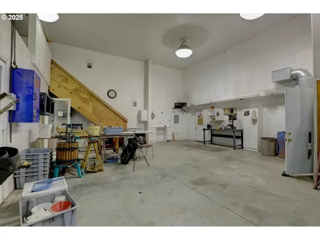 a view of a room with lots of furniture