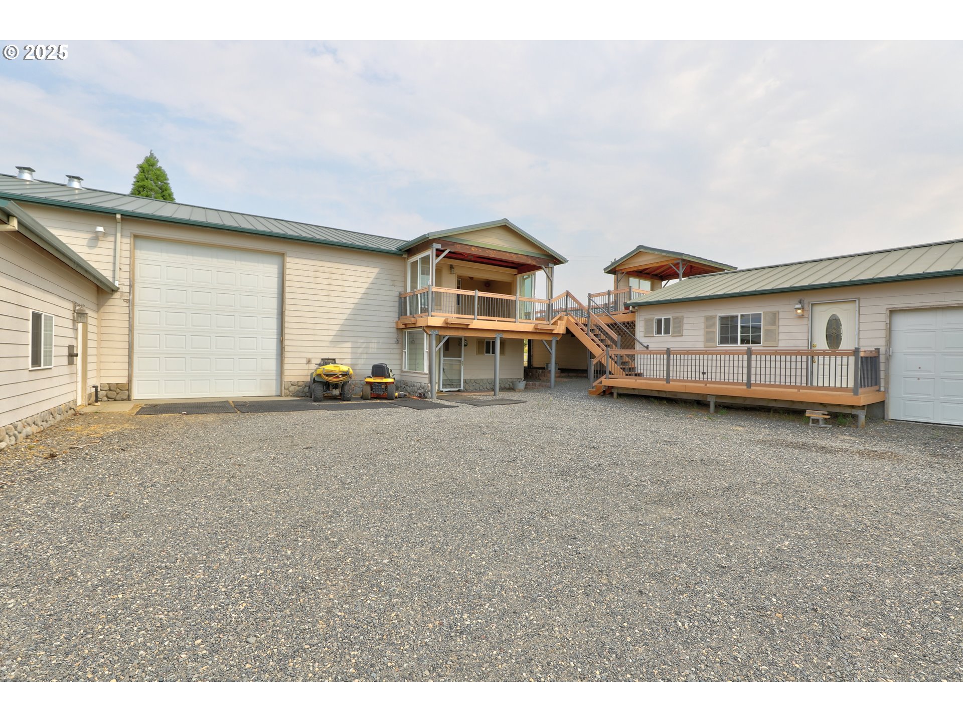 1520 Dallesport Road Dallesport, WA 98617 - Photo 2 of 48 a view of a house with a flat screen tv