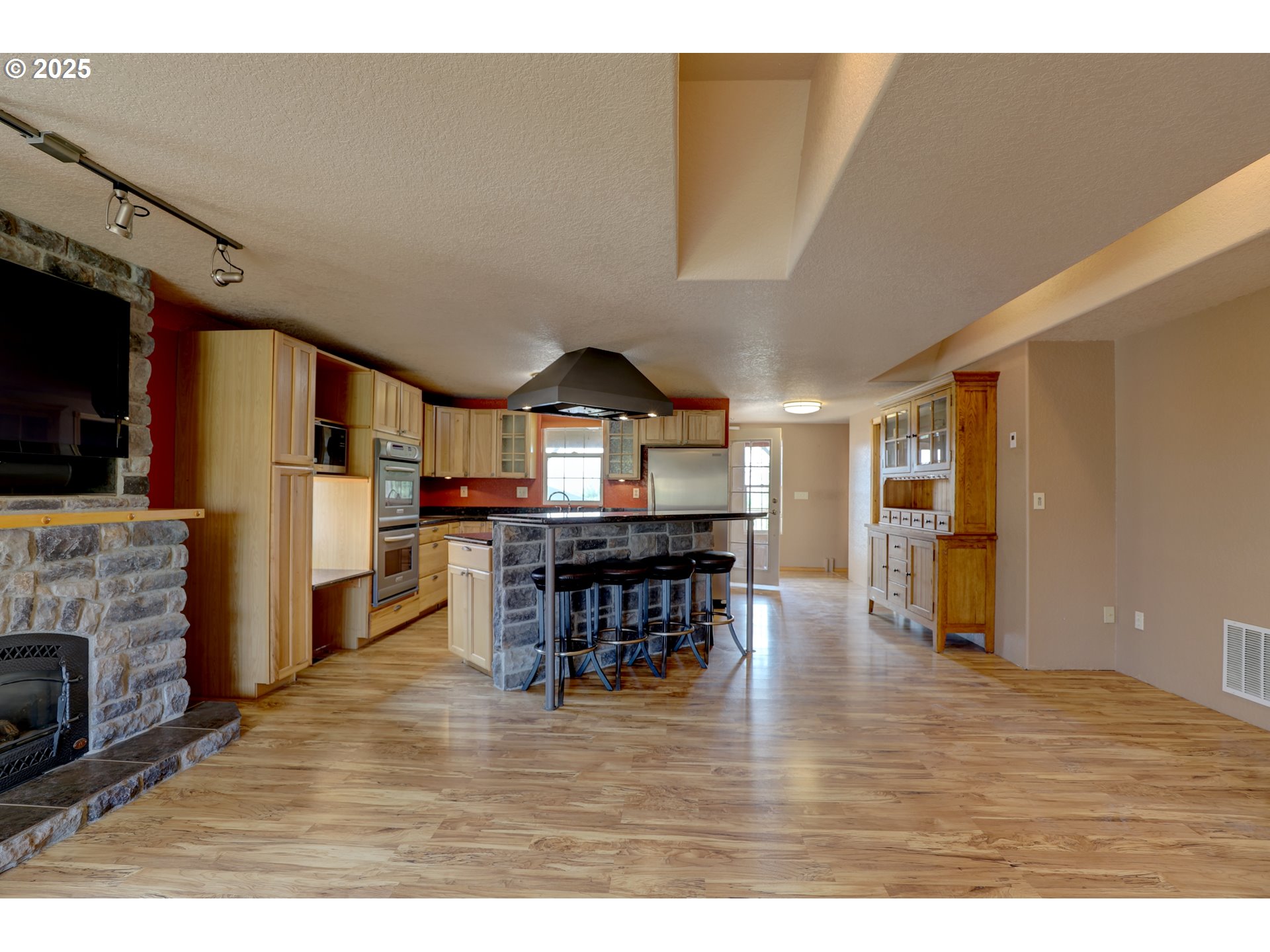 1520 Dallesport Road Dallesport, WA 98617 - Photo 22 of 48 a living room with furniture and a wooden floor