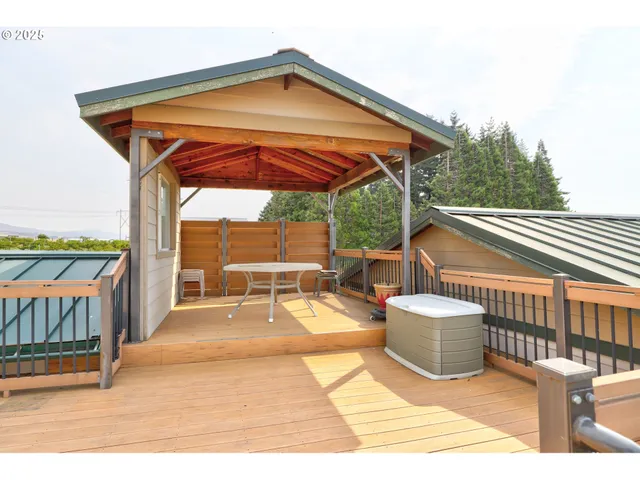 a patio with table and chairs