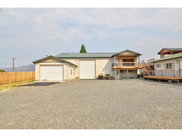 a big room with closet and a large window