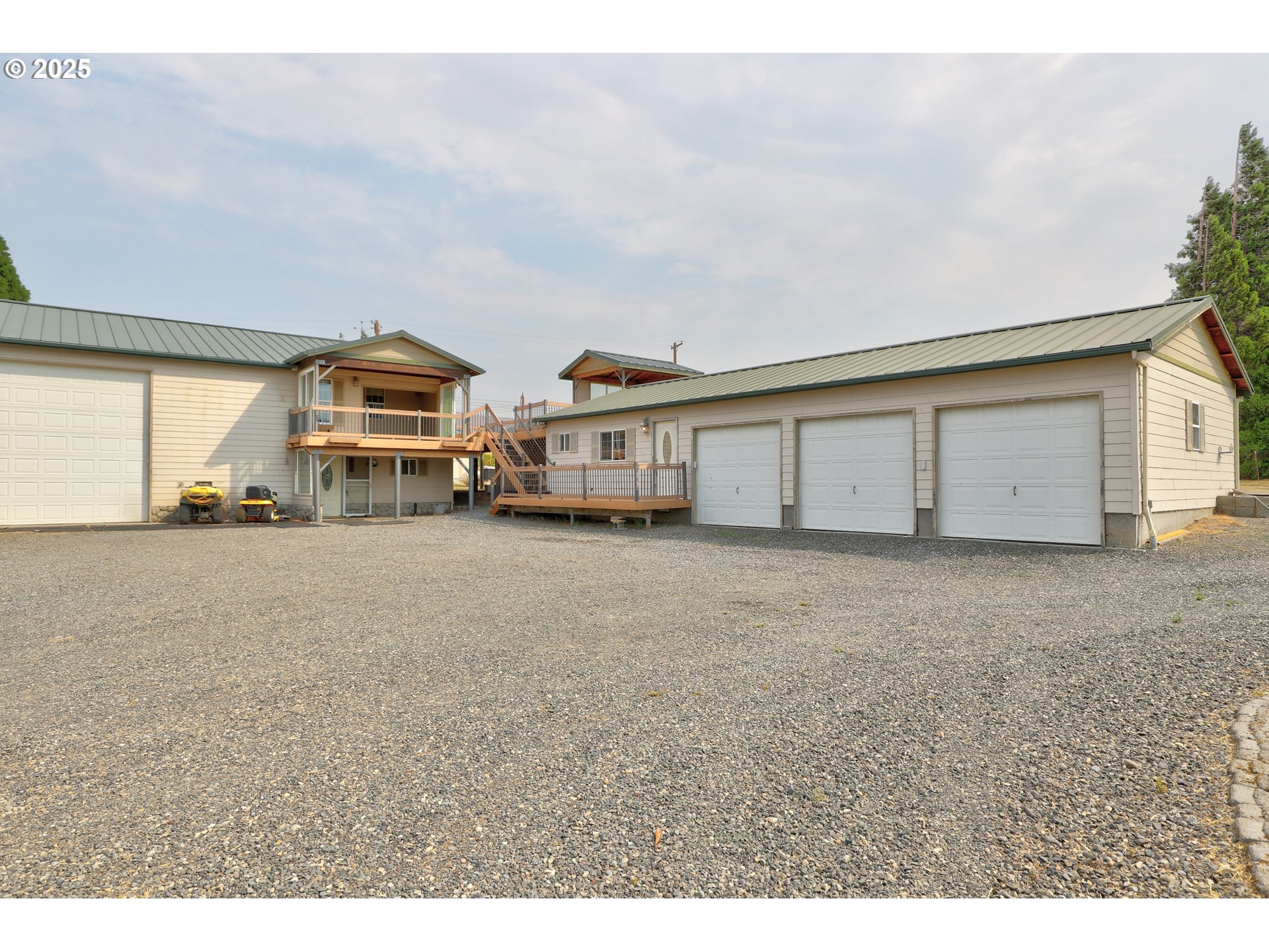 1520 Dallesport Road Dallesport, WA 98617 - Photo 32 of 48 a view of a house with a big yard and large trees