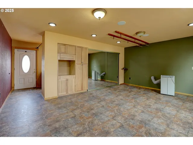 a view of a livingroom with a furniture