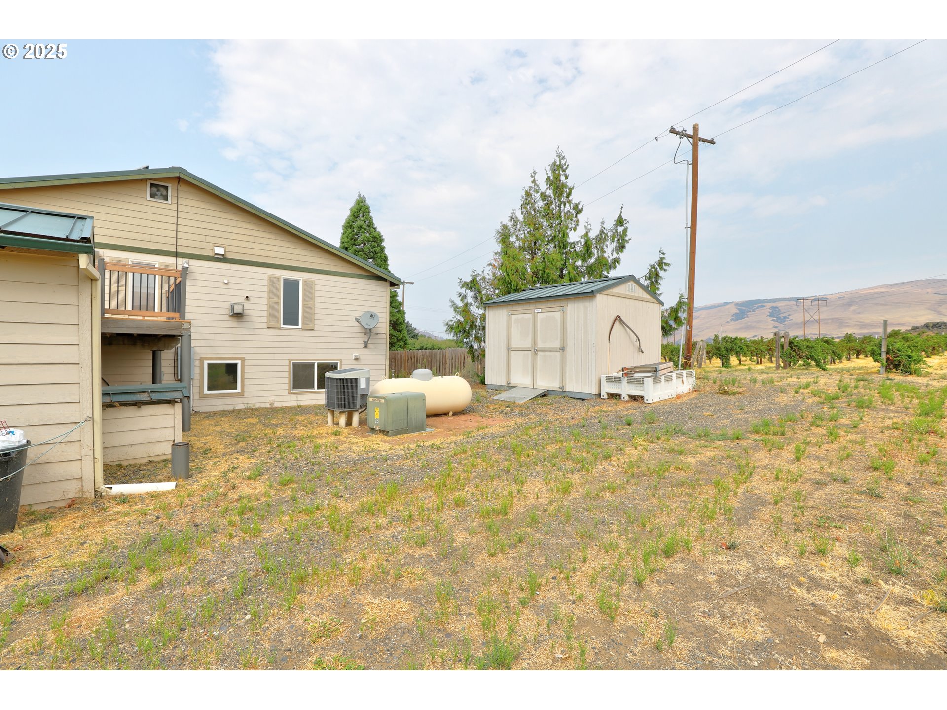 1520 Dallesport Road Dallesport, WA 98617 - Photo 43 of 48 a house view with a outdoor space