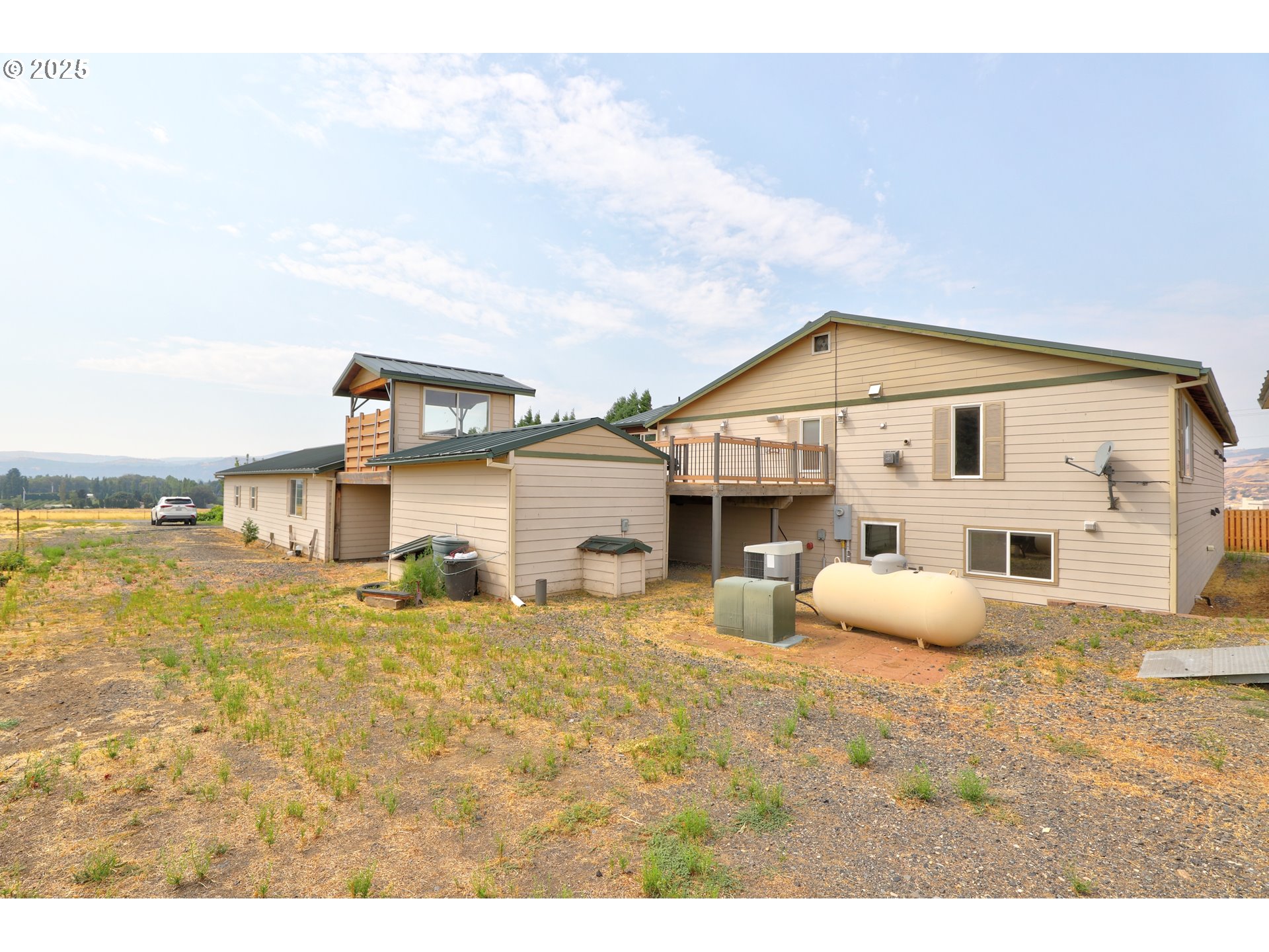1520 Dallesport Road Dallesport, WA 98617 - Photo 44 of 48 a view of a house with a backyard