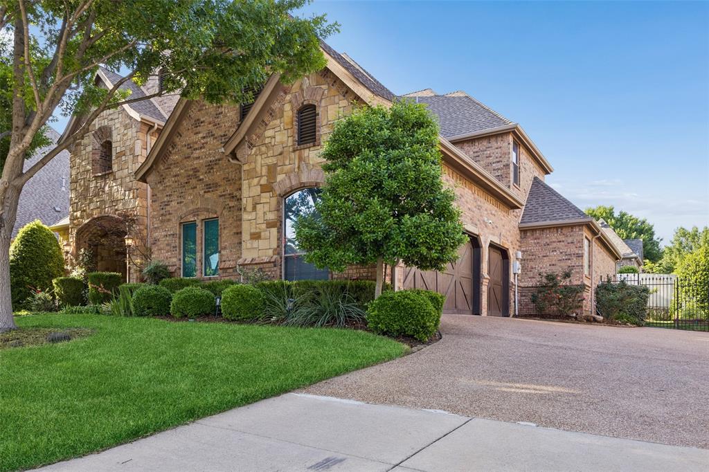 1608 Tuscan Ridge Circle Southlake, TX 76092 - Photo 2 of 36 a front view of house with yard and green space