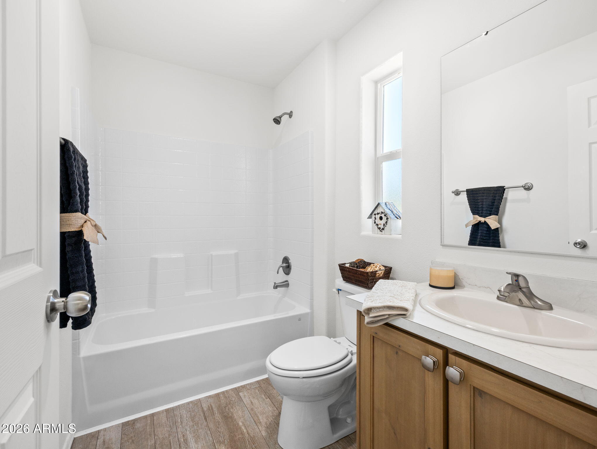 18296 Frontier Road Peeples Valley, AZ 86332 - Photo 3 of 44 a bathroom with a granite countertop sink toilet and shower
