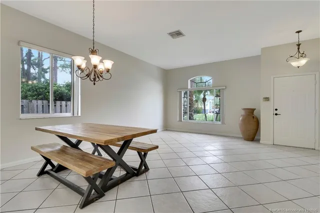 a view of a livingroom with furniture and window