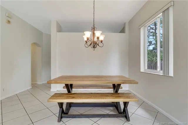 a living room with furniture and flat screen tv