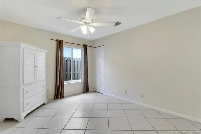 a kitchen with stainless steel appliances granite countertop a refrigerator a stove top oven a sink and dishwasher