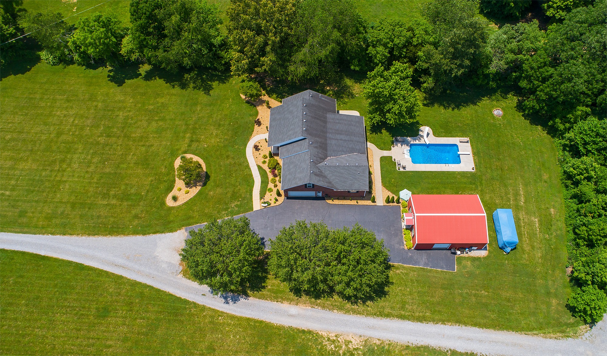 182 West Harper Road Portland, TN 37148 - Photo 24 of 29 an aerial view of a house with a yard