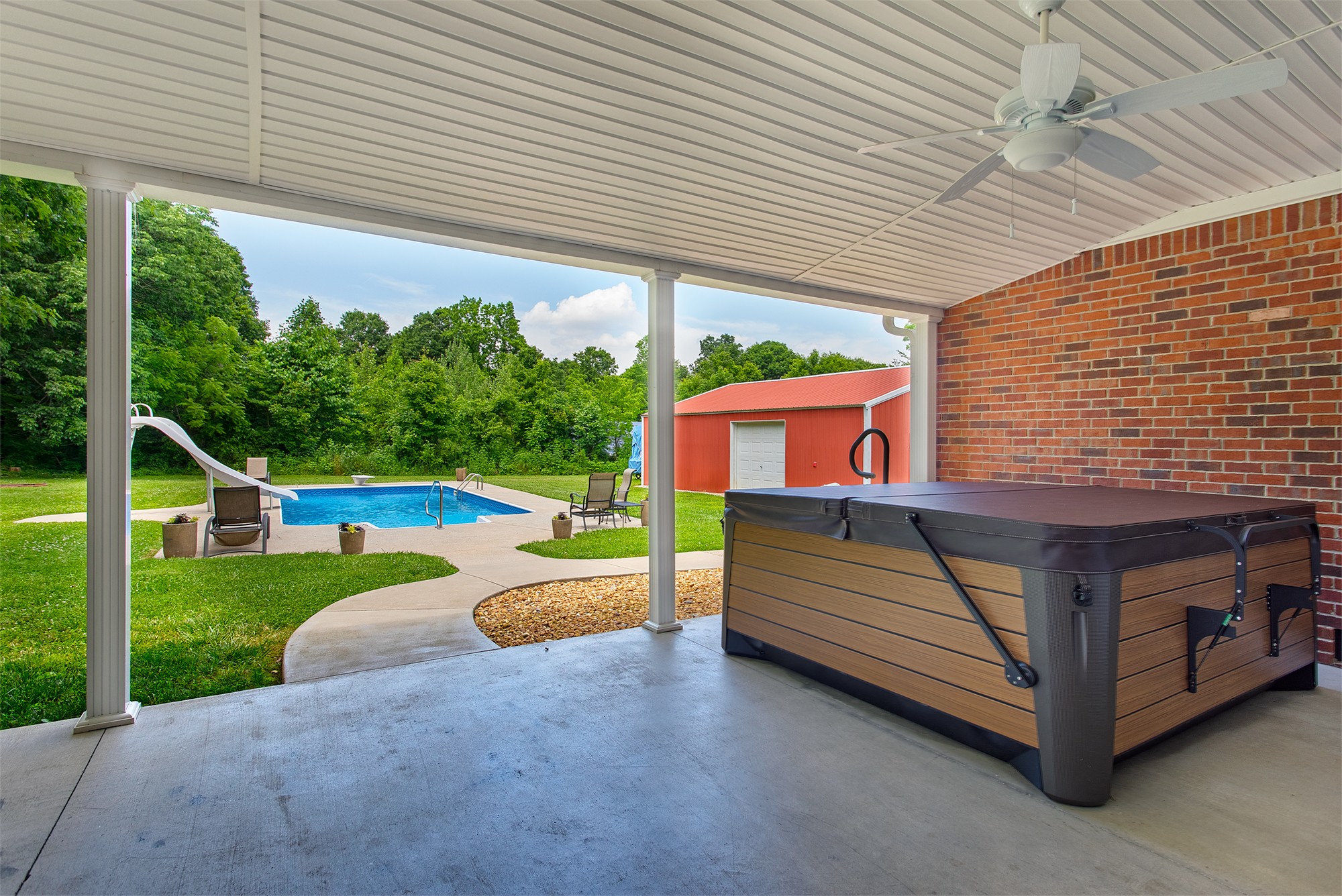 182 West Harper Road Portland, TN 37148 - Photo 5 of 29 a view of a back yard with a chair