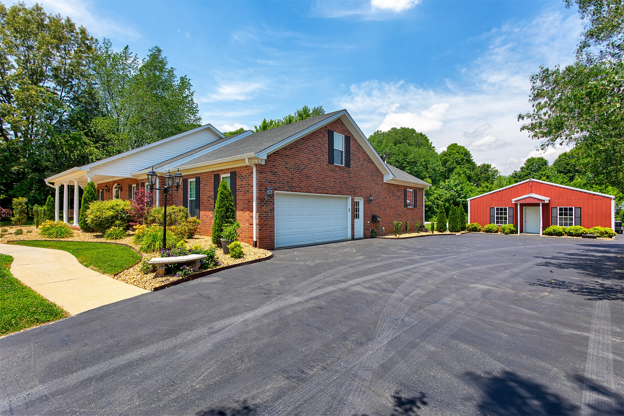 182 West Harper Road Portland, TN 37148 - Photo 6 of 29 a front view of a house with garden