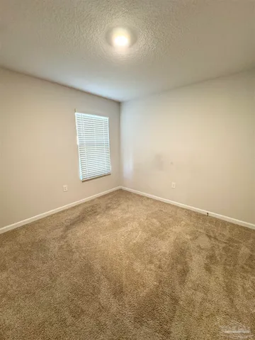 an empty room with a natural light