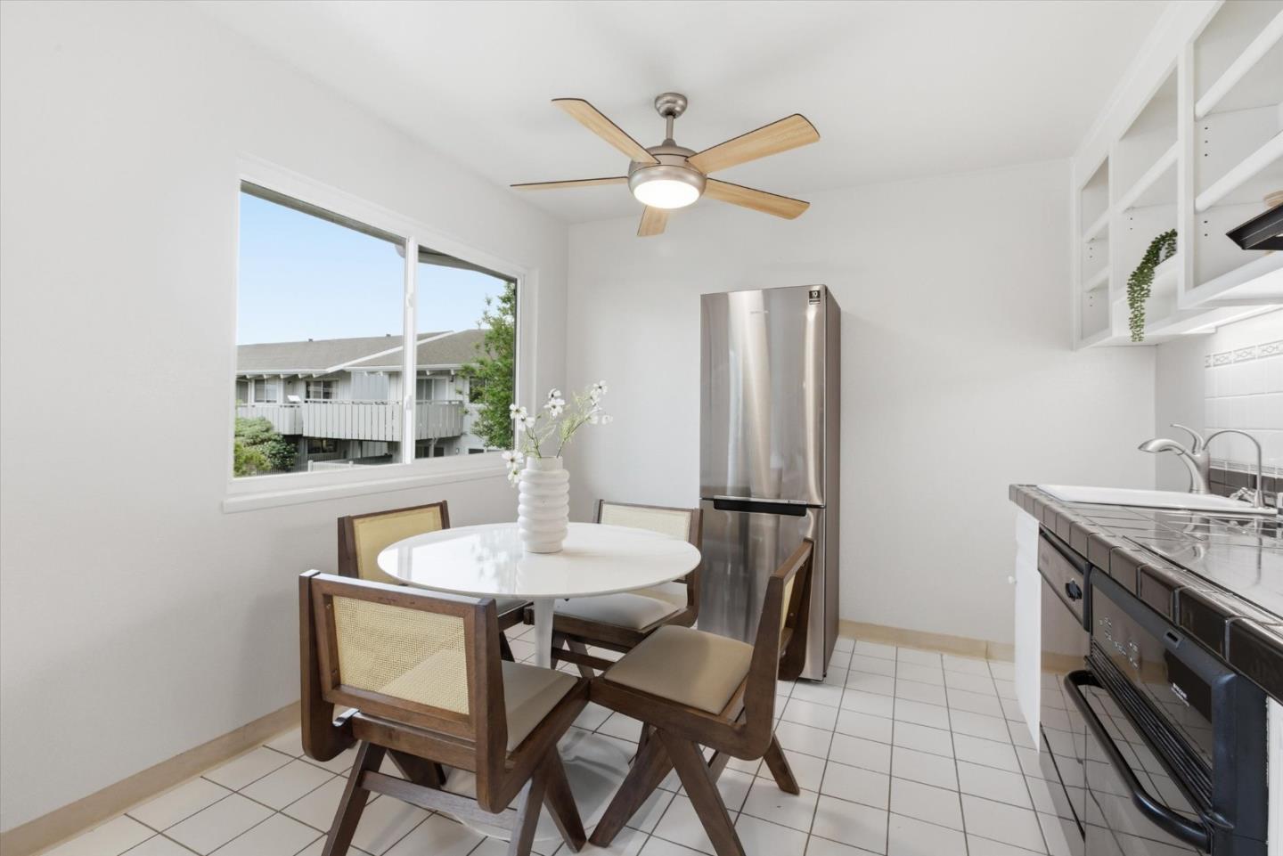 255 South Rengstorff Avenue, Unit 58 Mountain View, CA 94040 - Photo 11 of 27 a dining room with furniture and window