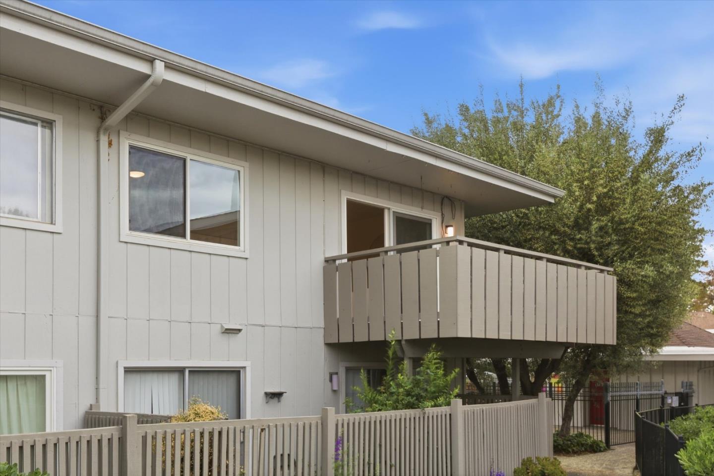 255 South Rengstorff Avenue, Unit 58 Mountain View, CA 94040 - Photo 2 of 27 a view of a house with backyard and deck