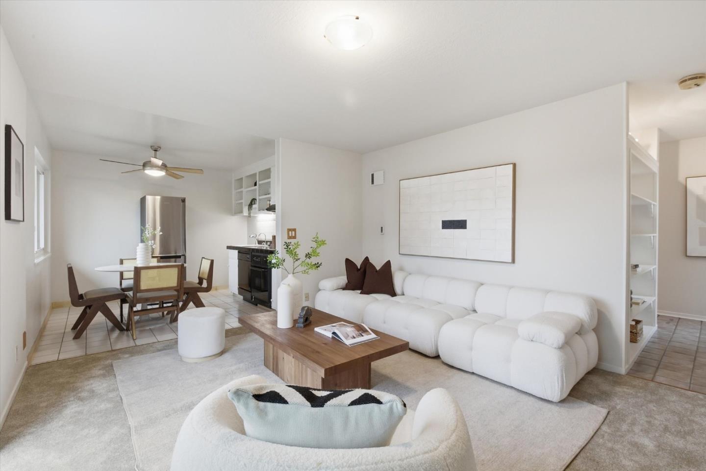 255 South Rengstorff Avenue, Unit 58 Mountain View, CA 94040 - Photo 6 of 27 a living room with furniture