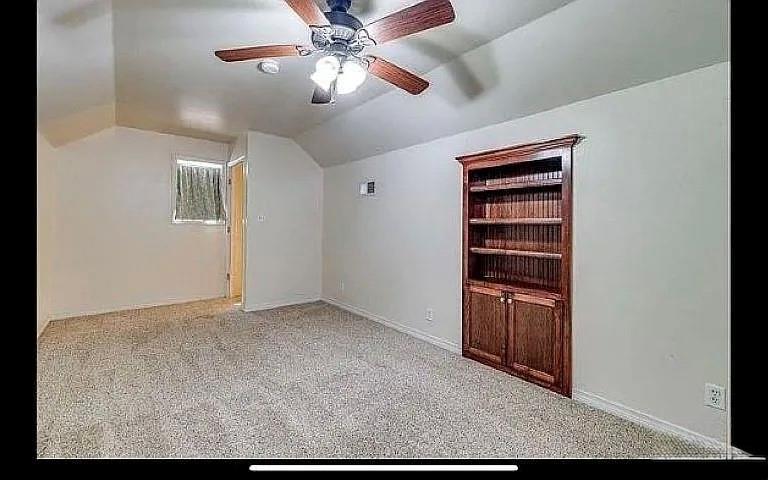 1401 Olin Hills Road Farmerville, LA 71241 - Photo 17 of 18 an empty room with closet and chandelier fan