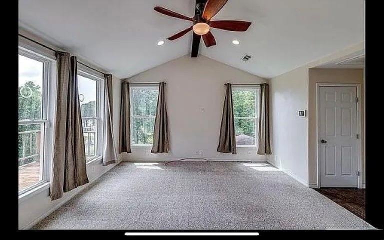 1401 Olin Hills Road Farmerville, LA 71241 - Photo 7 of 18 a view of a livingroom with a ceiling fan and window