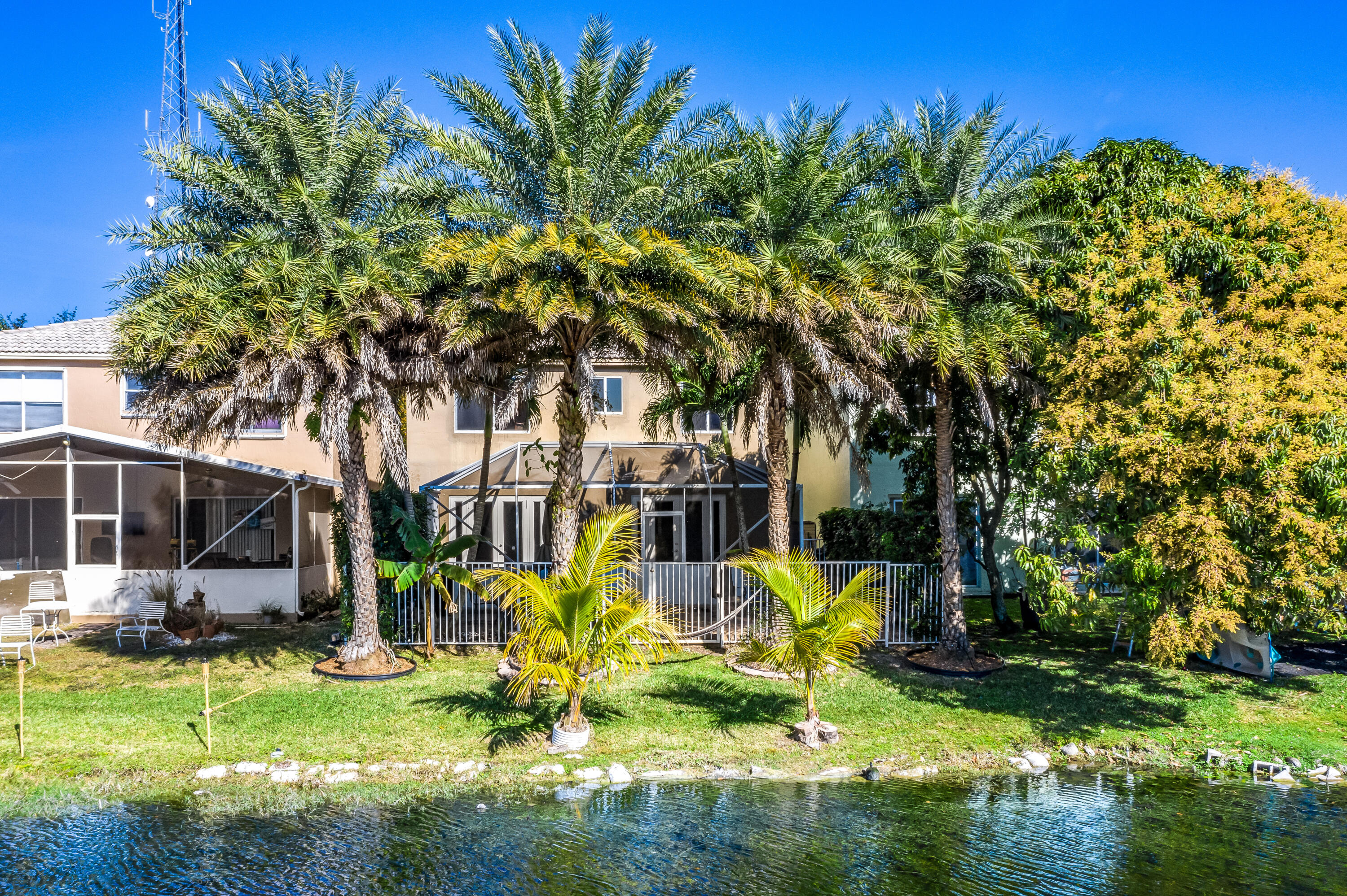 5236 Eagle Cay Way Coconut Creek, FL 33073 - Photo 30 of 33 front view of a house with a yard