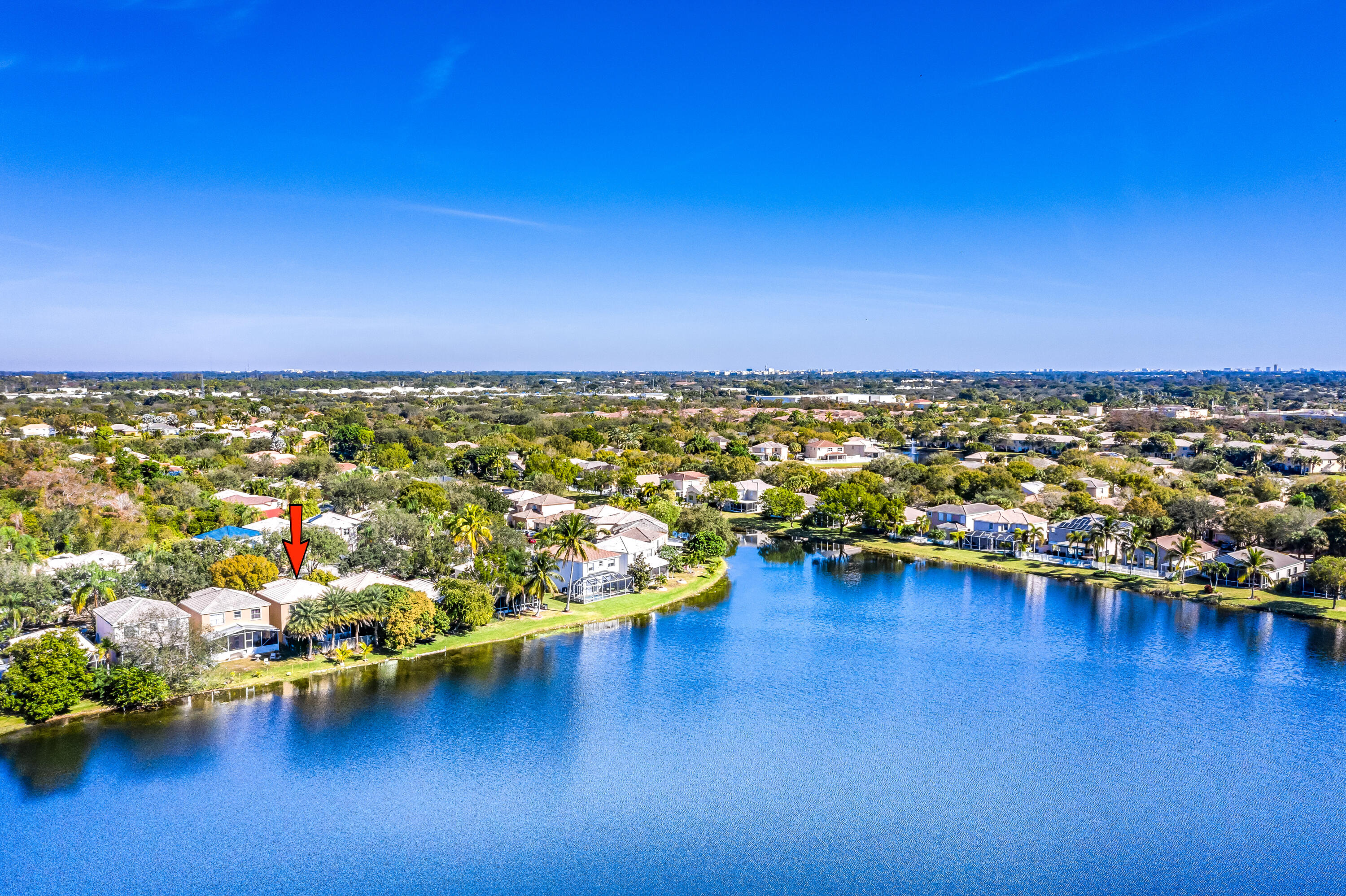 5236 Eagle Cay Way Coconut Creek, FL 33073 - Photo 31 of 33 a view of a lake with boats and trees