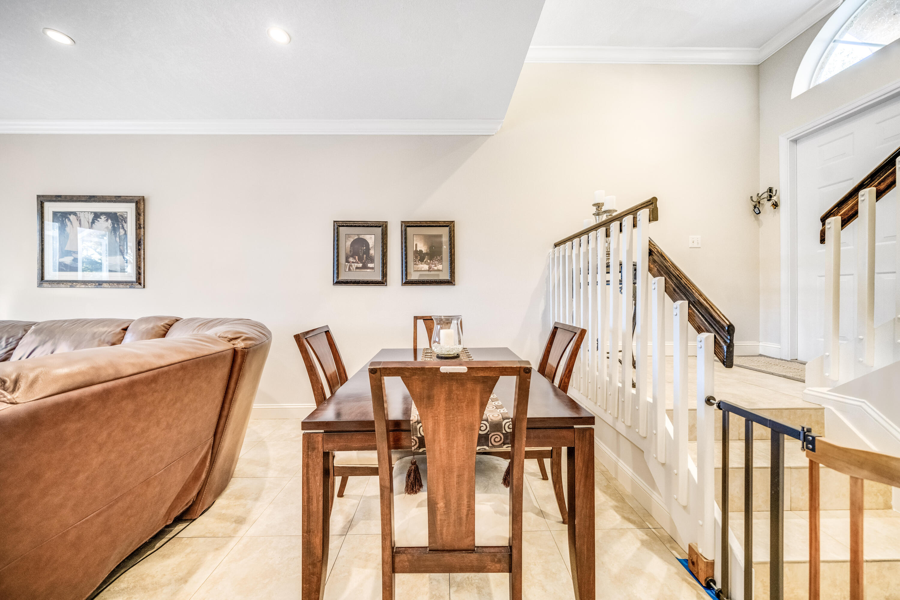 5236 Eagle Cay Way Coconut Creek, FL 33073 - Photo 5 of 33 a view of a dining room with furniture and wooden floor