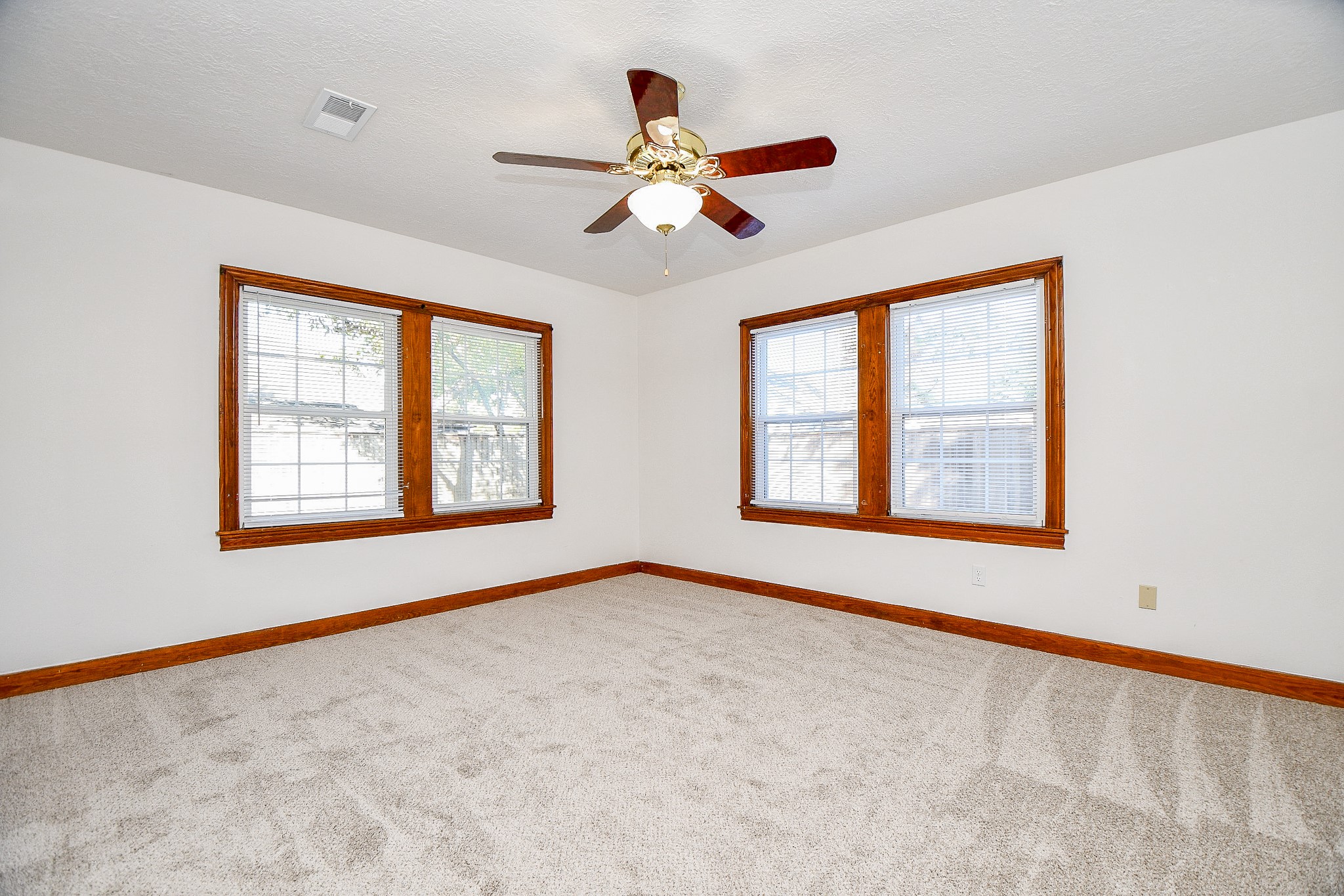 609 Milwaukee Street Houston, TX 77009 - Photo 11 of 32 a view of an empty room with a window