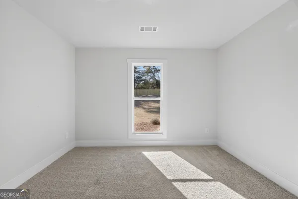 an empty room with a window