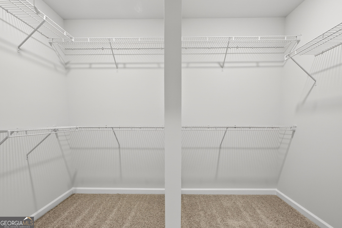 226 Airport Road, Unit 10 Canon, GA 30520 - Photo 33 of 43 a view of a room with racks on the wall