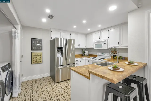 a view of a kitchen sink and a sink