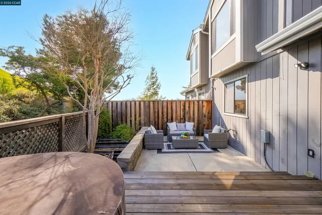 an aerial view of a house with swimming pool and outdoor space