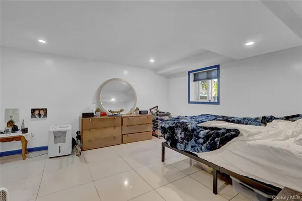 a bed room with a bed and a couch