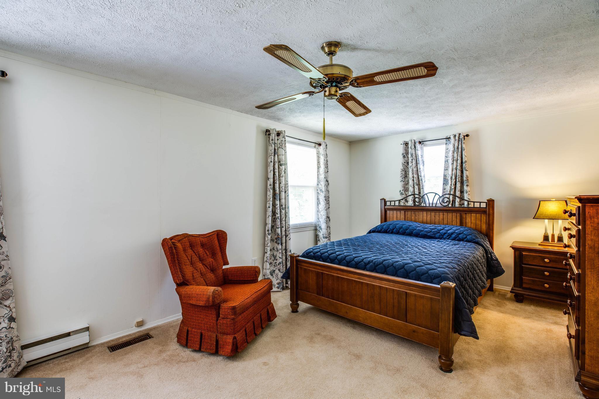 4314 Shepherds Road Partlow, VA 22534 - Photo 19 of 30 a bedroom with a bed and window