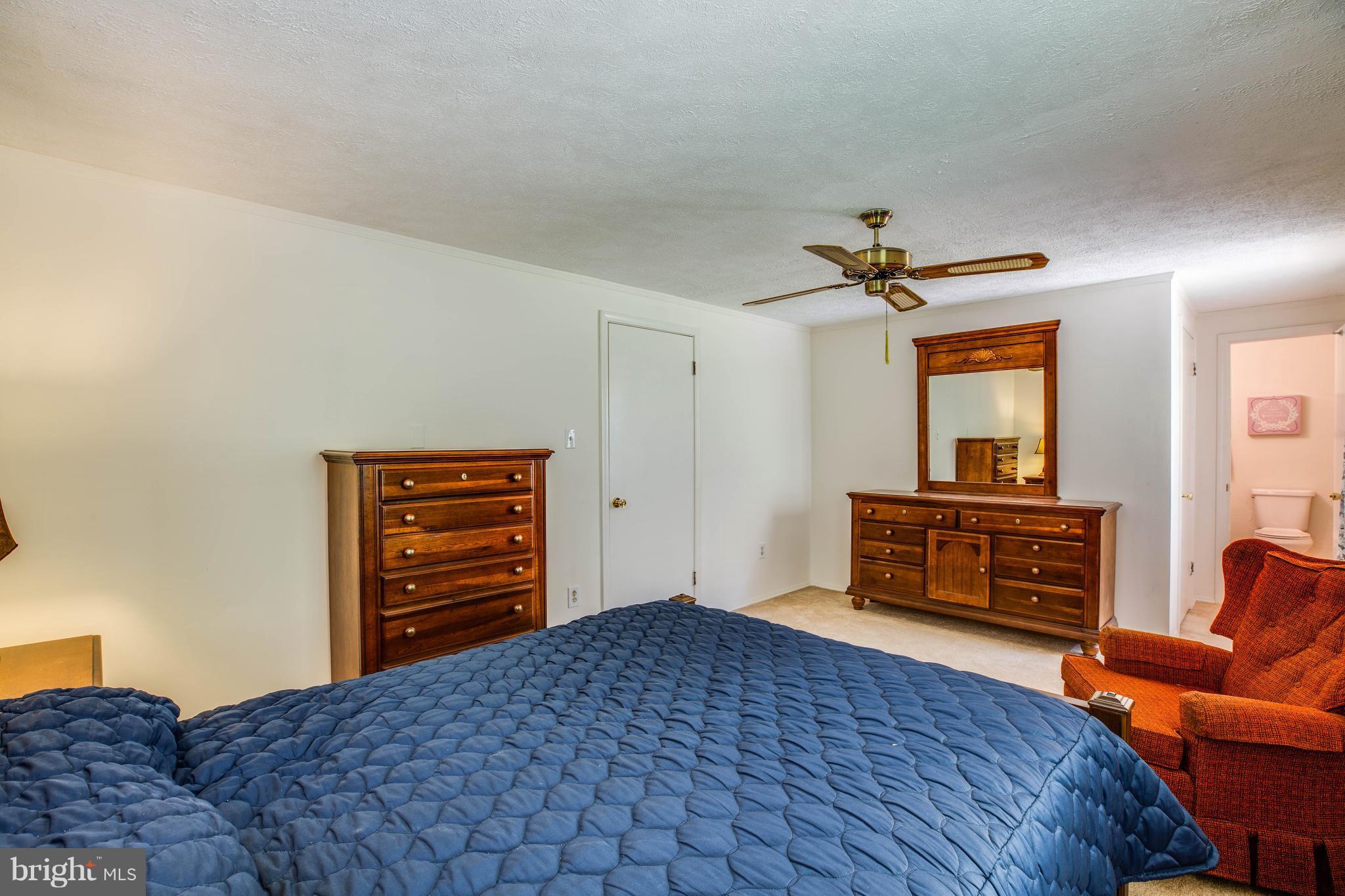 4314 Shepherds Road Partlow, VA 22534 - Photo 20 of 30 a bedroom with furniture and a dresser
