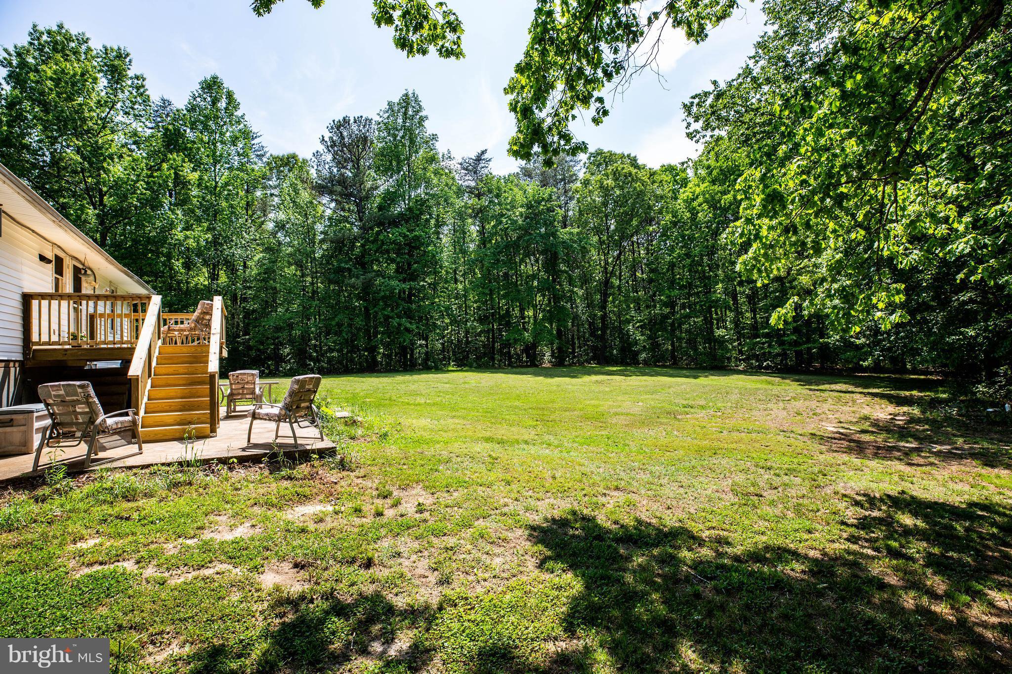 4314 Shepherds Road Partlow, VA 22534 - Photo 25 of 30 a view of a swimming pool with a patio