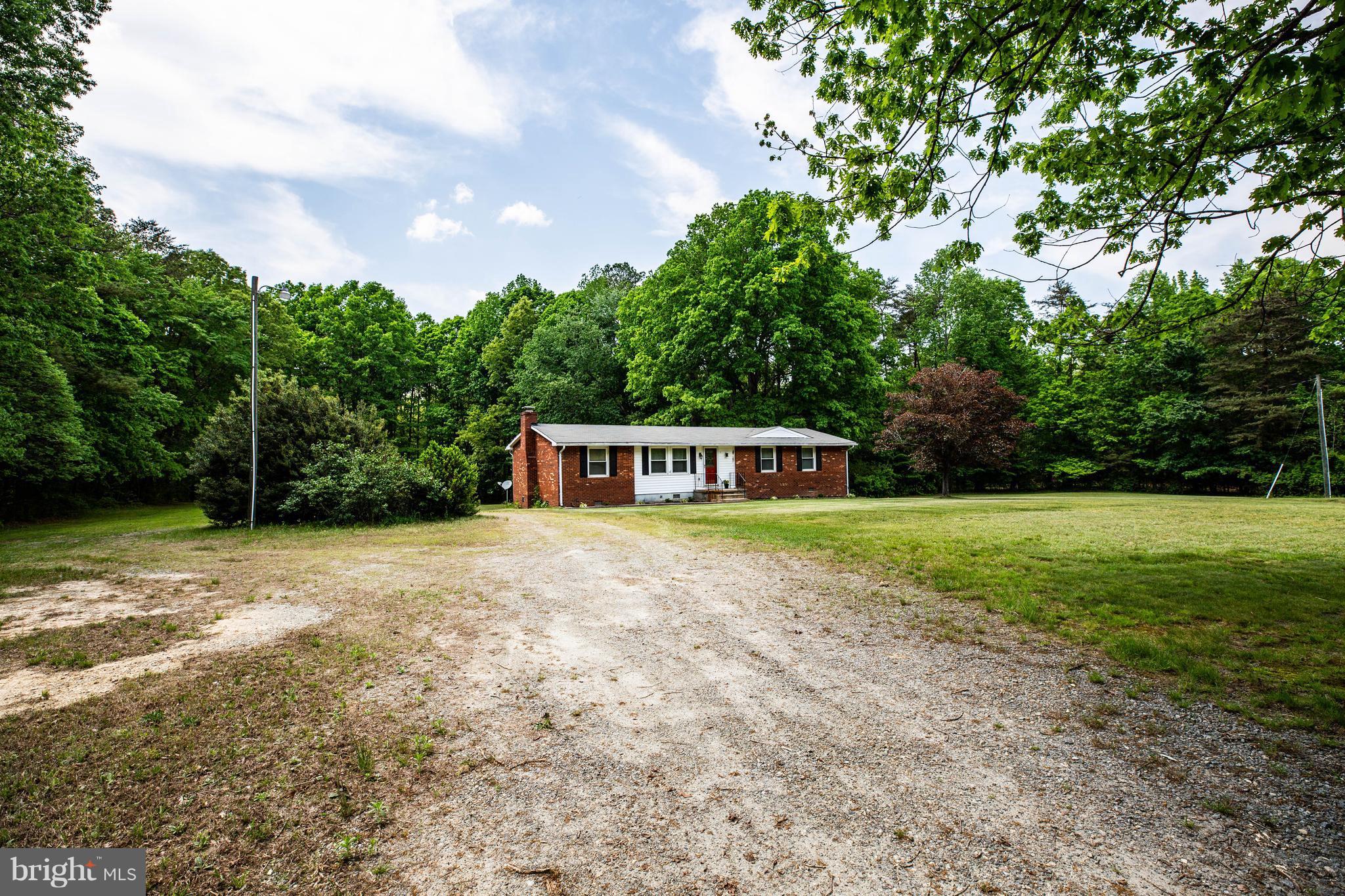 4314 Shepherds Road Partlow, VA 22534 - Photo 4 of 30 a view of a house with a yard