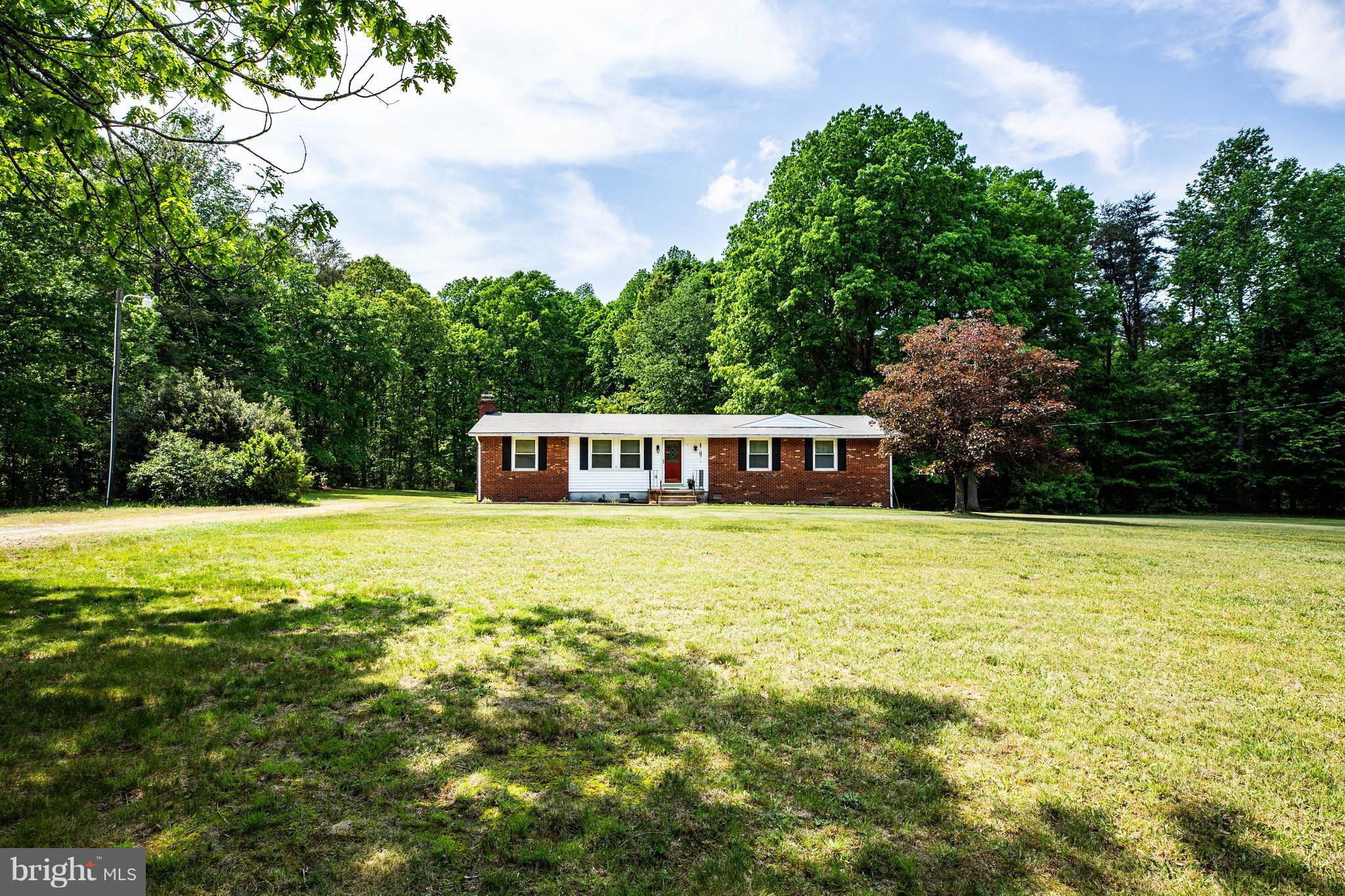 4314 Shepherds Road Partlow, VA 22534 - Photo 5 of 30 a front view of a house with a yard
