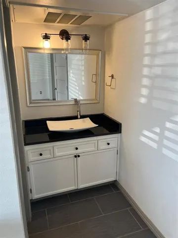a bathroom with a toilet and a bathtub